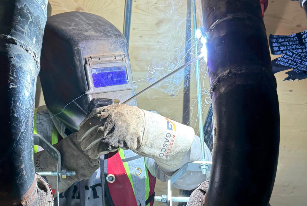 Pressure welding Burnaby BC - certified SMAW hydronic piping installation on commercial HVAC project